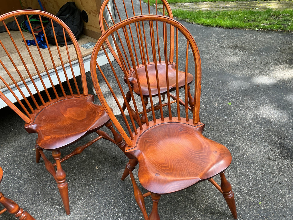 2 fanback arm chairs and 6 bowback side chairs by J.L. Treharn