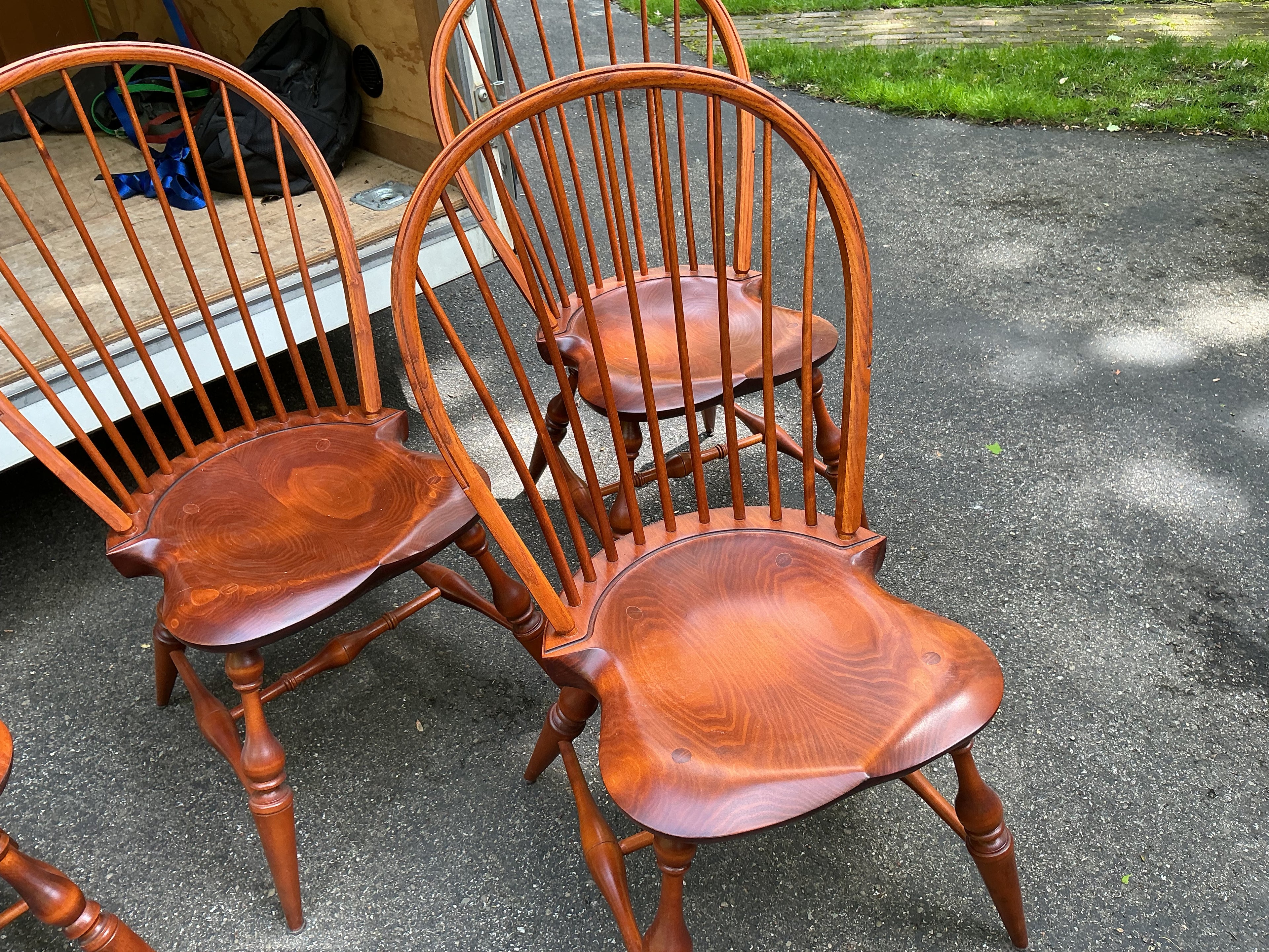 2 fanback arm chairs and 6 bowback side chairs by J.L. Treharn