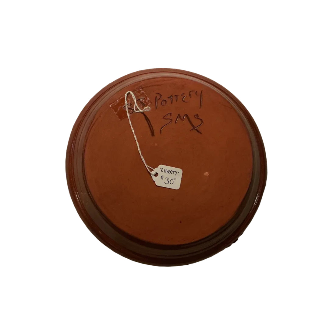 7.5” redware plate by Susan Skinner of SJ Pottery