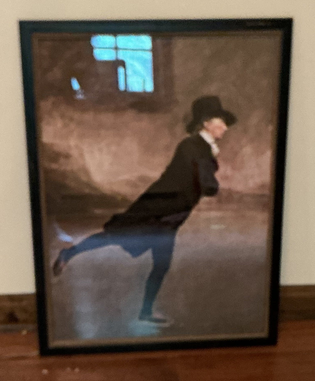 Reverend Walker skating behind glass