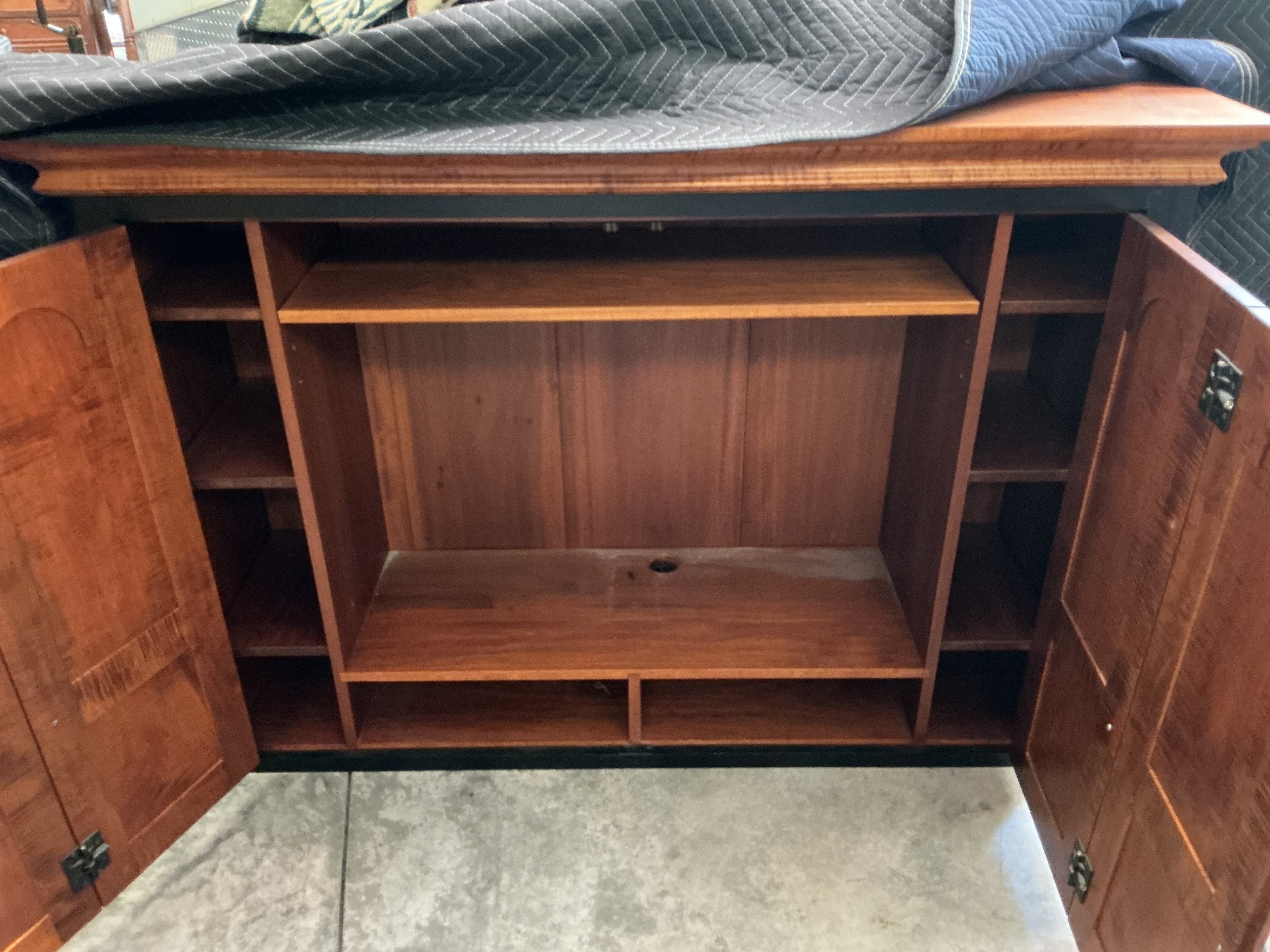 Original customer entertainment center/dresser by J.L. Treharn. Tiger maple doors and drawers in old maple finish