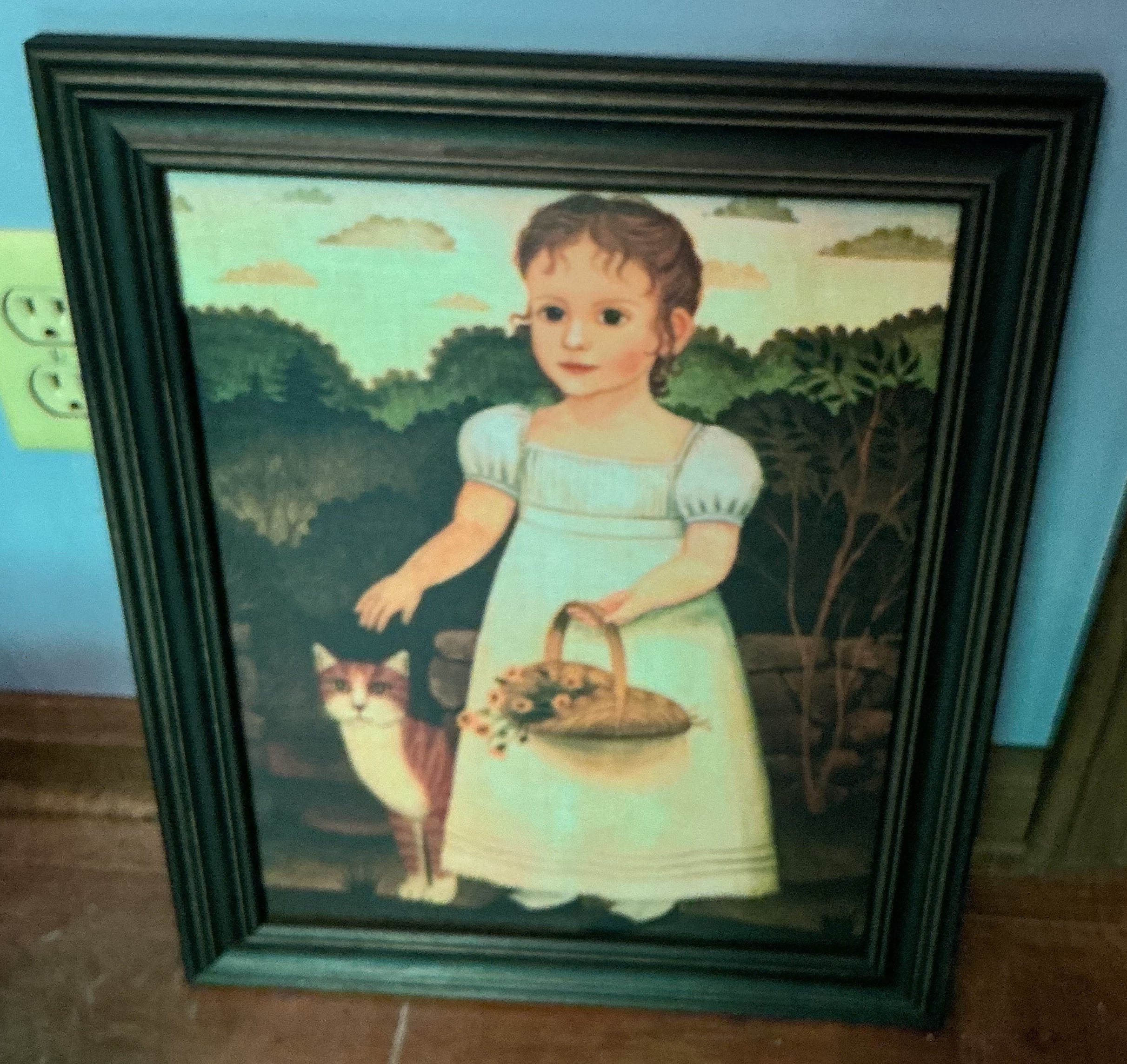 Picture of young girl with cat