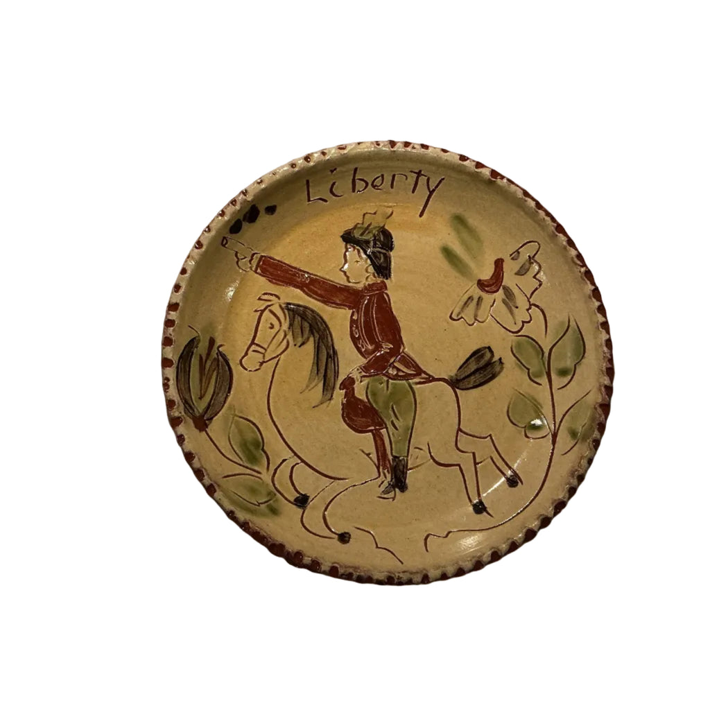 7.5” redware plate by Susan Skinner of SJ Pottery