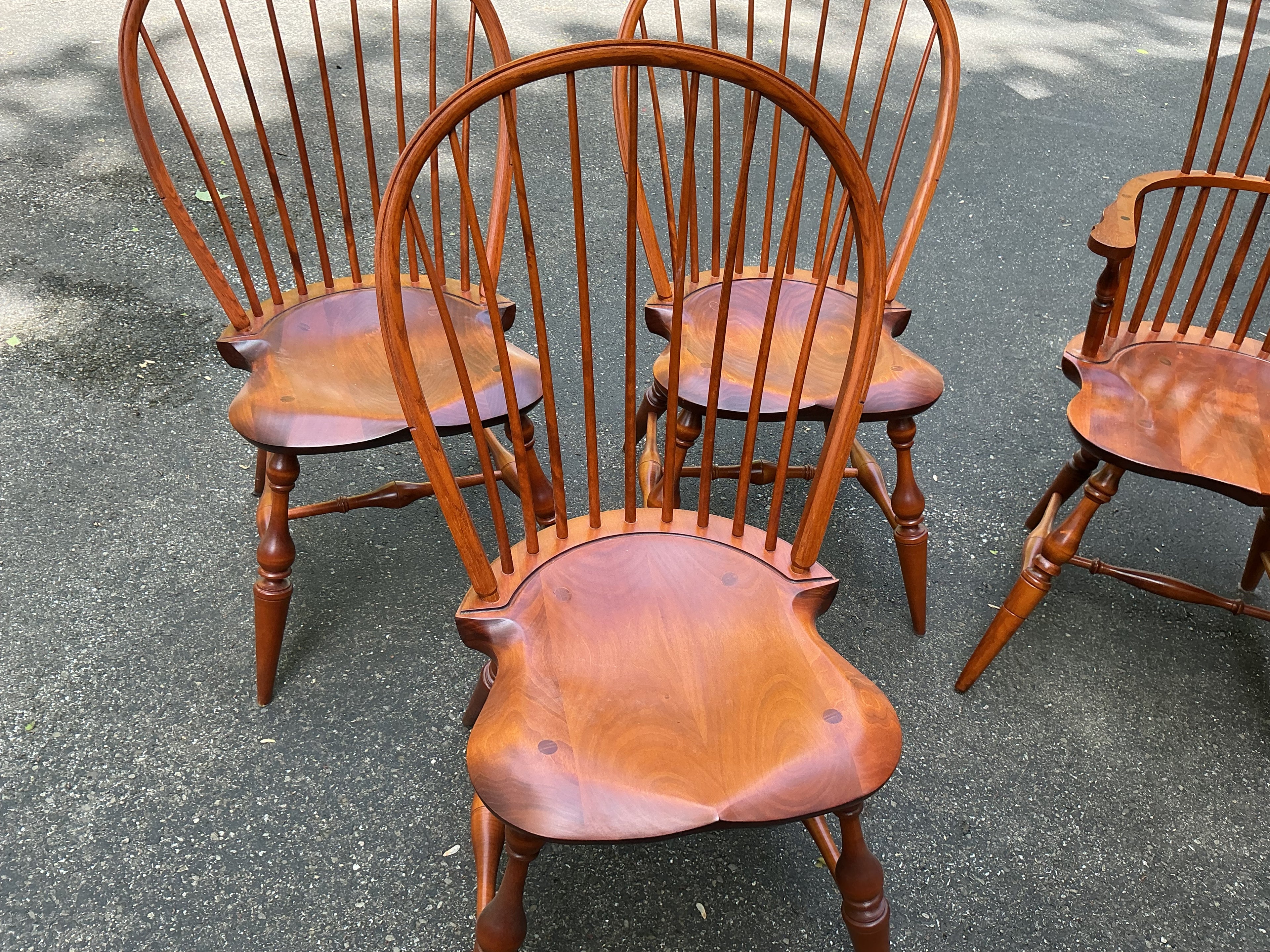 2 fanback arm chairs and 6 bowback side chairs by J.L. Treharn