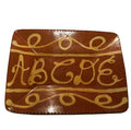 11” by 8.75” redware plate by Betty Lou of Turtlecreek Pottery