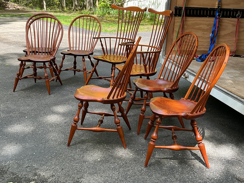 2 fanback arm chairs and 6 bowback side chairs by J.L. Treharn