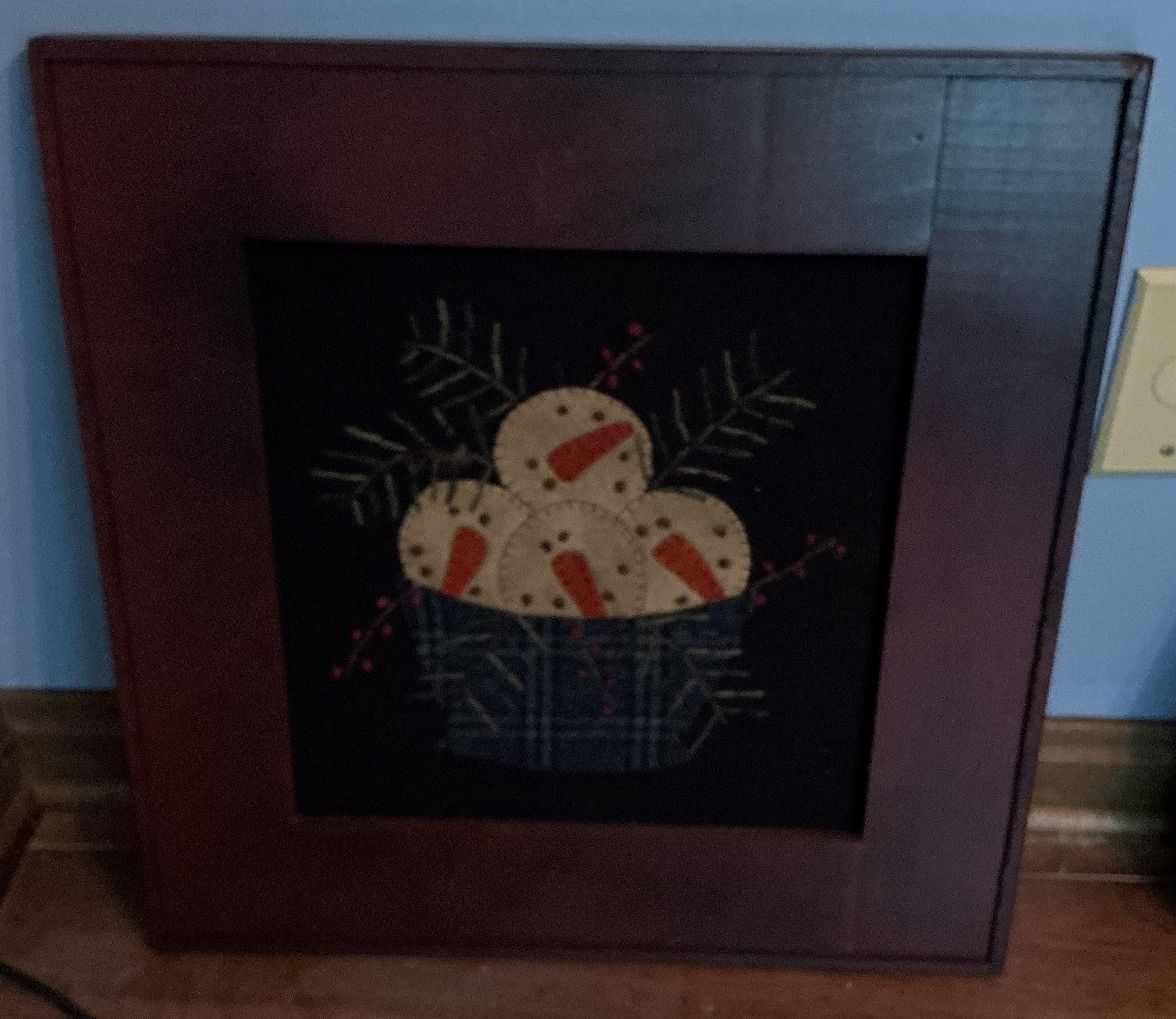 Hand made snowman sign on felt