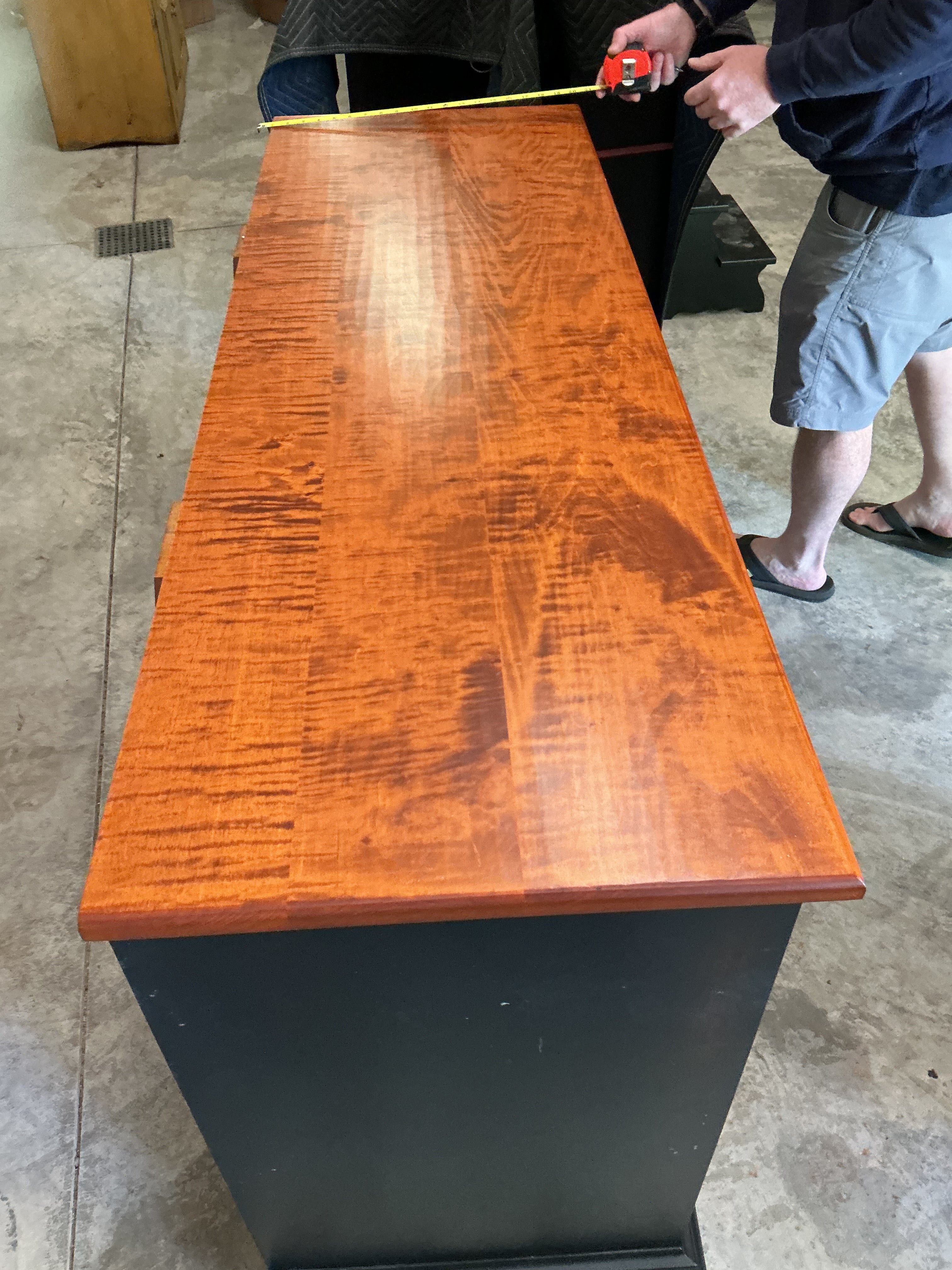 Original Lancaster County Cupboard by J.L. Treharn. Black over old maple rub with tiger maple deck in old maple stain. Brass hardware (was an upcharge)