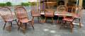 2 fanback arm chairs and 6 bowback side chairs by J.L. Treharn